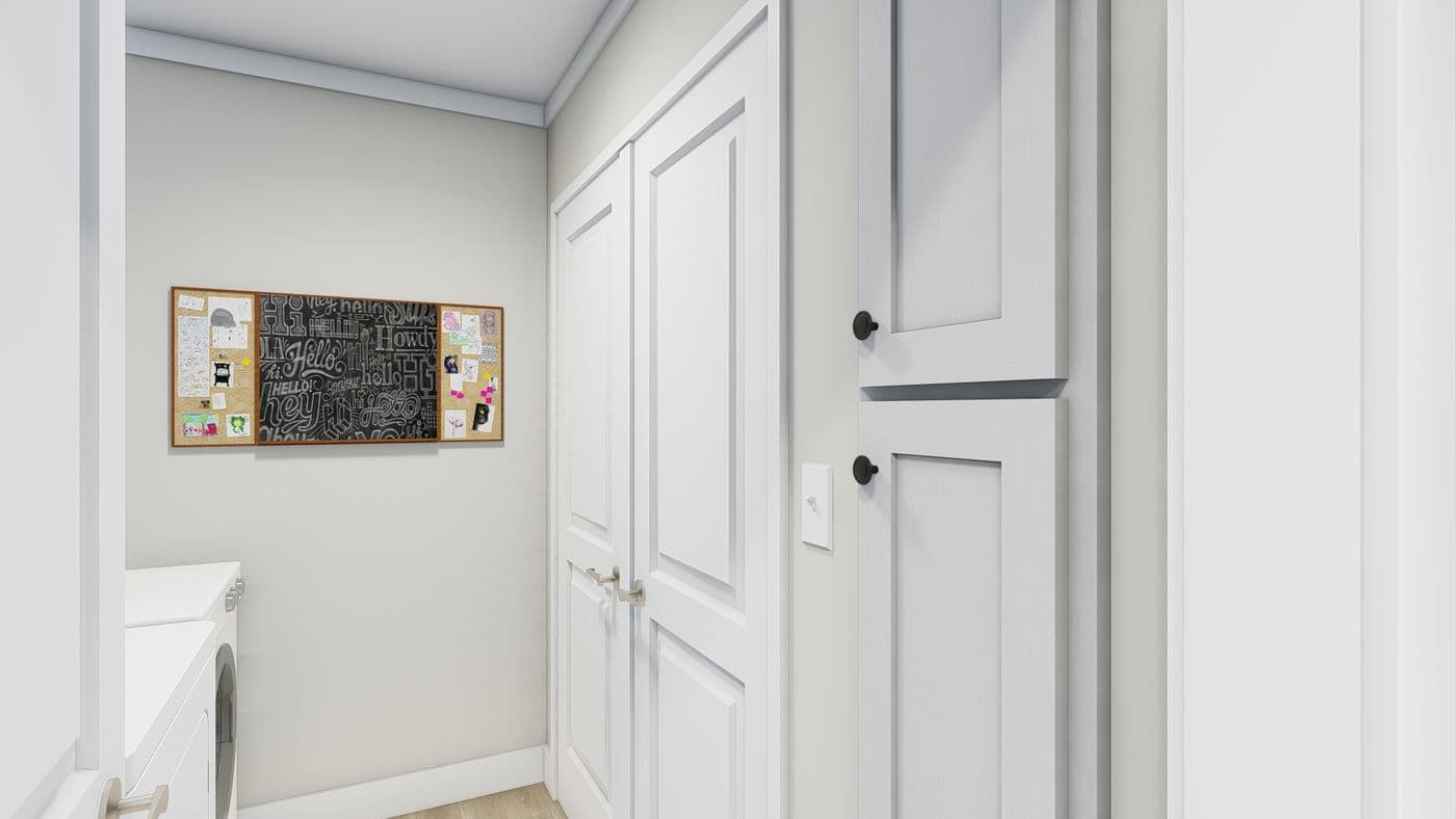 The CLASSIC 56D Utility Room. This Manufactured Mobile Home features 3 bedrooms and 2 baths.