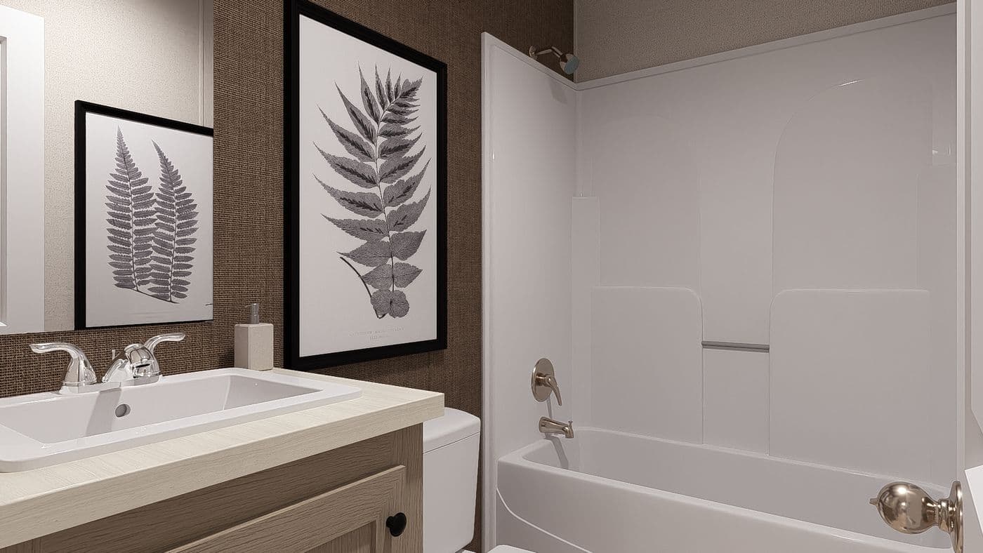 The BLAZER 66 B Guest Bathroom. This Manufactured Mobile Home features 3 bedrooms and 2 baths.