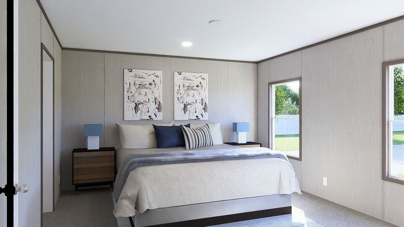 The ULTRA BREEZE 28X76 Primary Bedroom. This Manufactured Mobile Home features 4 bedrooms and 2 baths.