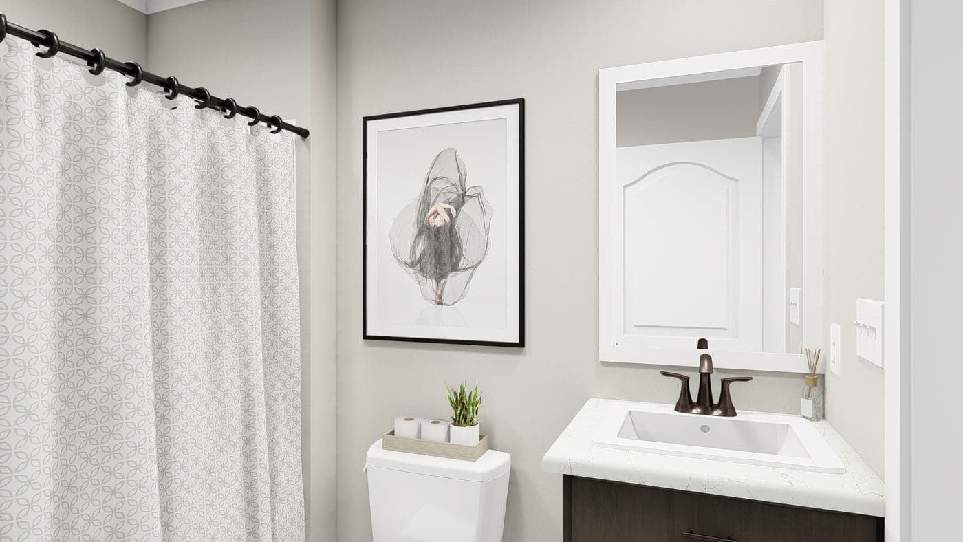 The THE ALEXANDER Guest Bathroom. This Manufactured Mobile Home features 3 bedrooms and 2 baths.