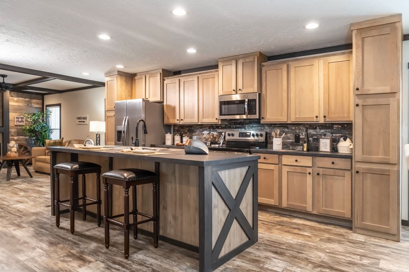 The BOUJEE 2 Kitchen. This Manufactured Mobile Home features 3 bedrooms and 2 baths.