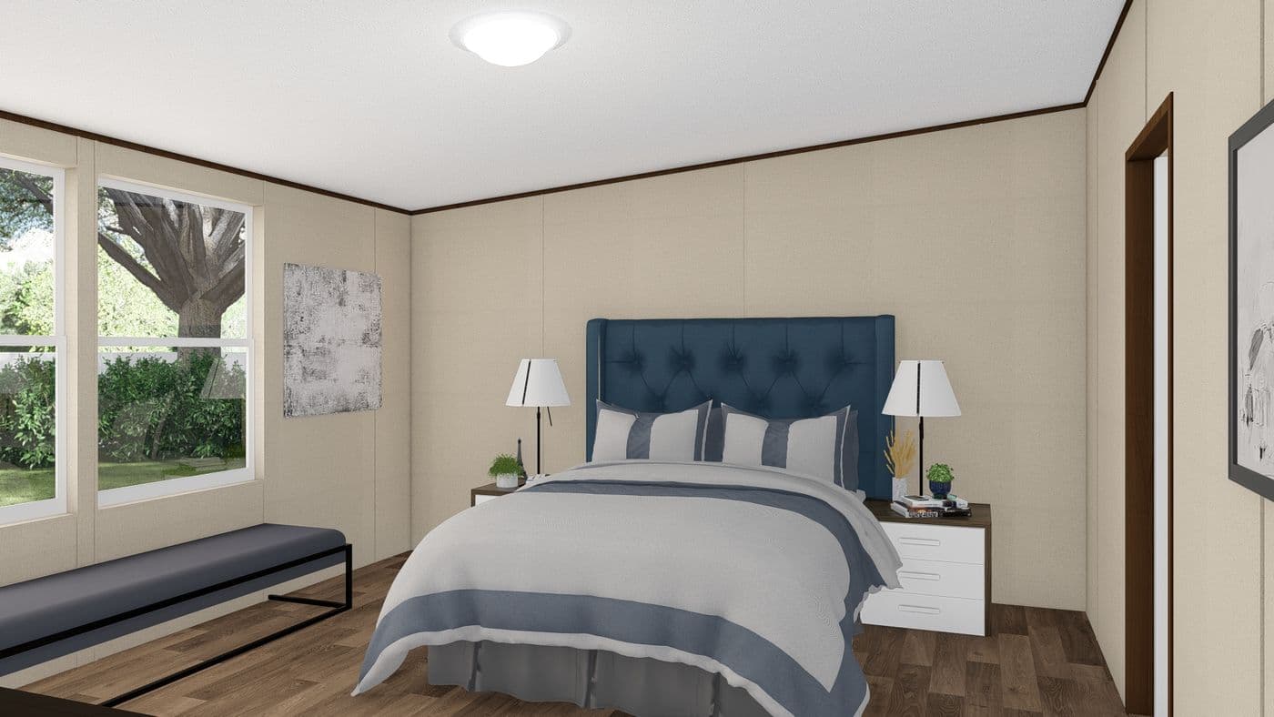 The MARVELOUS 3 Primary Bedroom. This Manufactured Mobile Home features 3 bedrooms and 2 baths.
