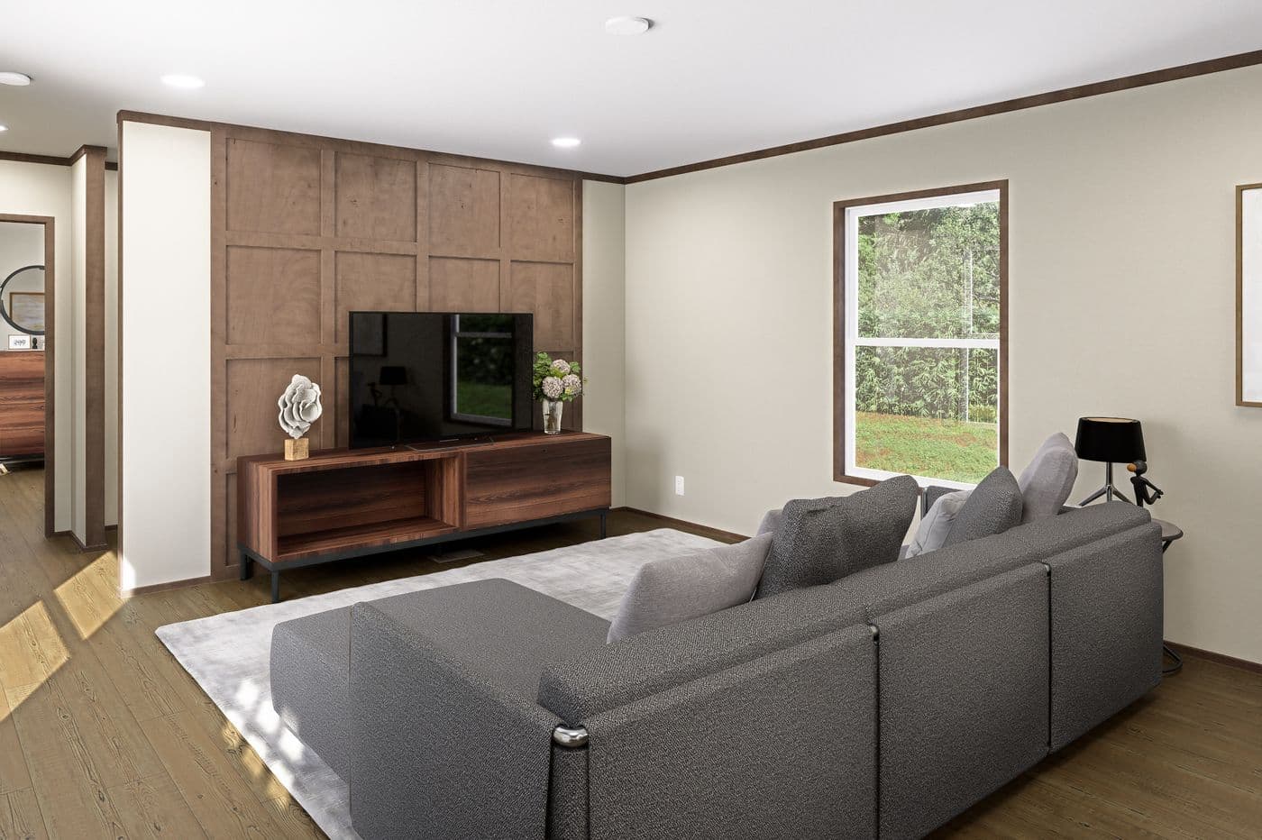 The VOYAGE Living Room. This Manufactured Mobile Home features 3 bedrooms and 2 baths.