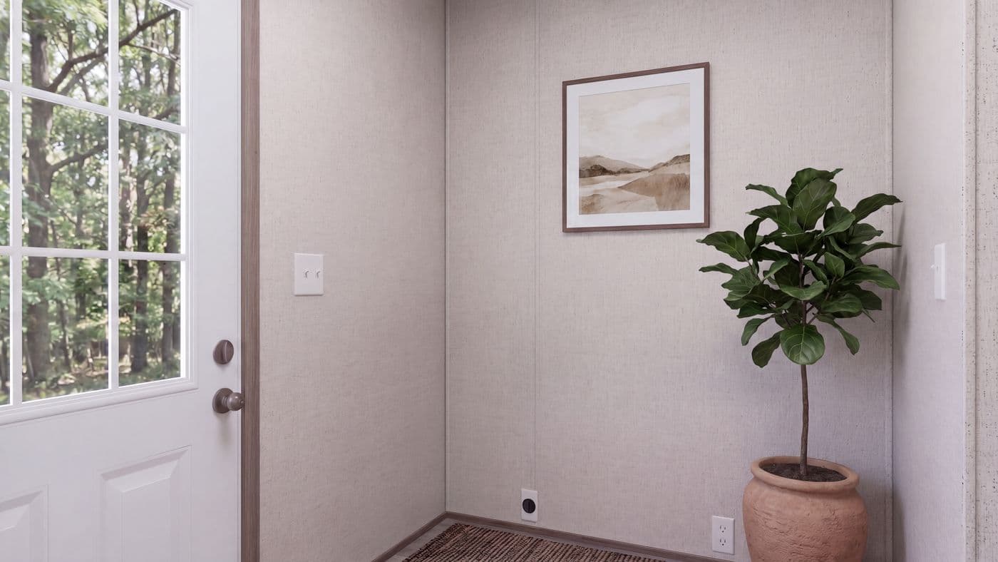 The THE MOUNTAINEER 60 Utility Room. This Manufactured Mobile Home features 3 bedrooms and 2 baths.