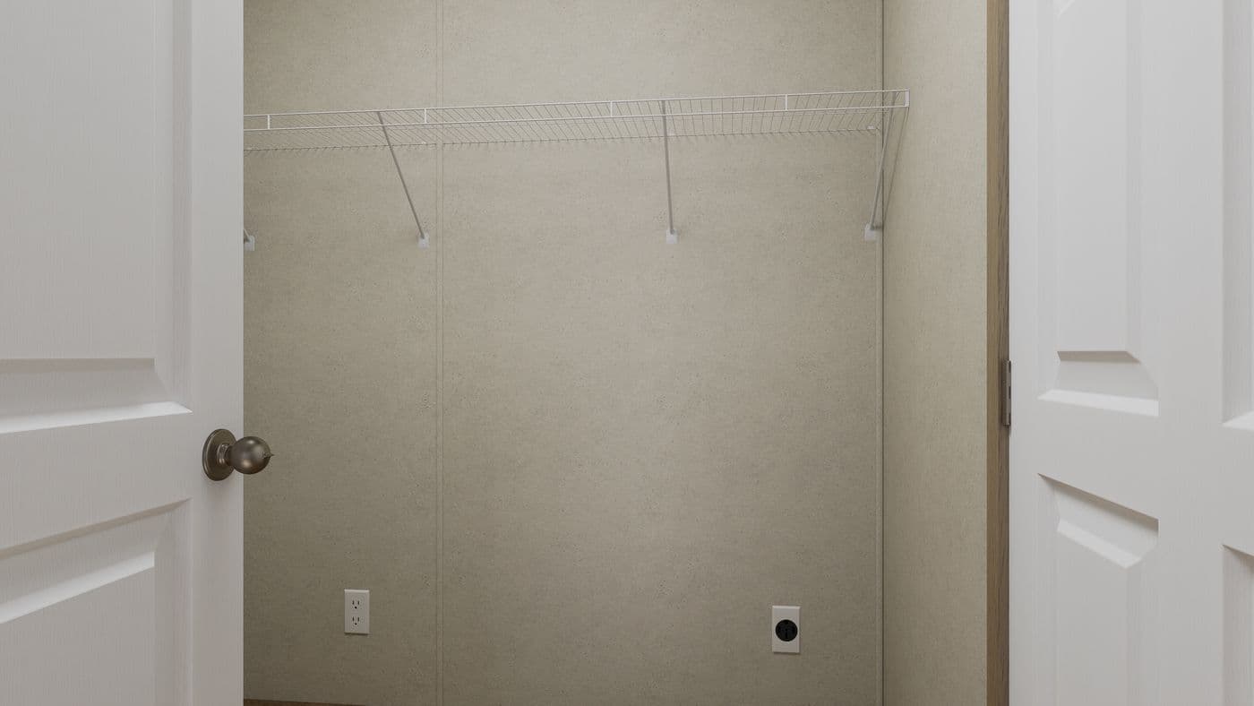 The 4824-CC54 OAKSTEAD 48 Utility Room. This Manufactured Mobile Home features 3 bedrooms and 2 baths.