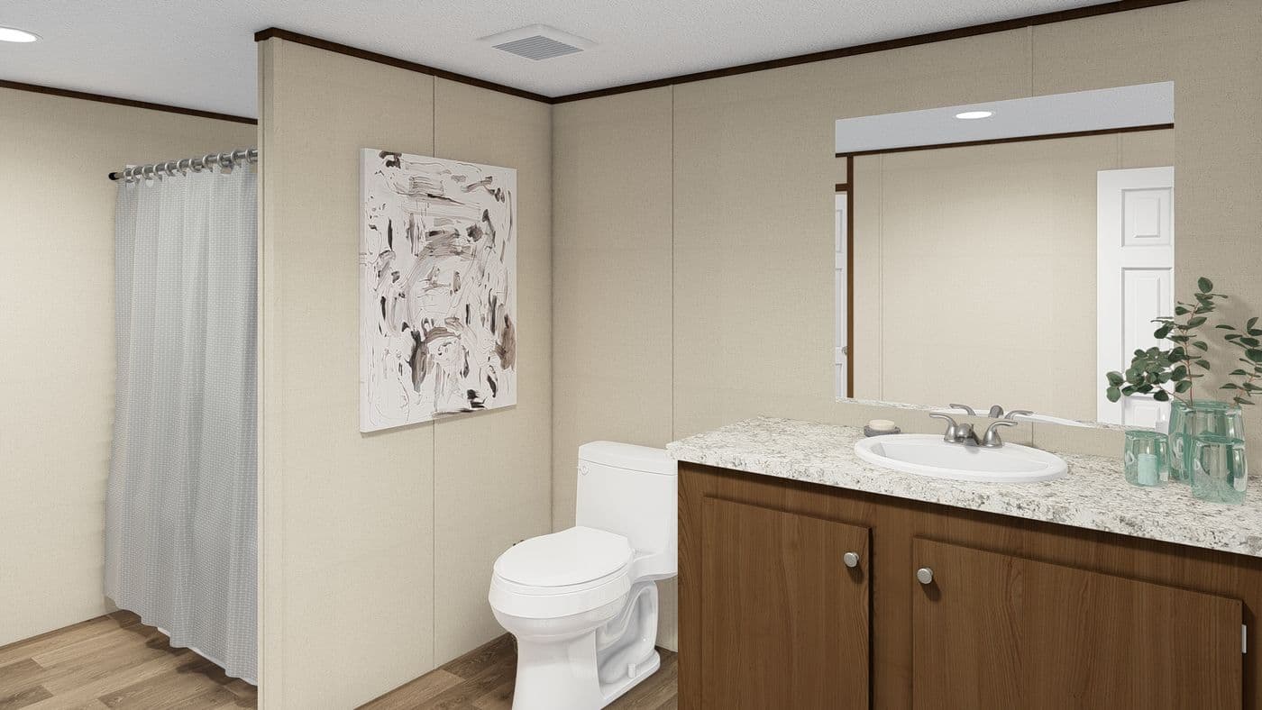 The MARVEL 4 Primary Bathroom. This Manufactured Mobile Home features 4 bedrooms and 2 baths.