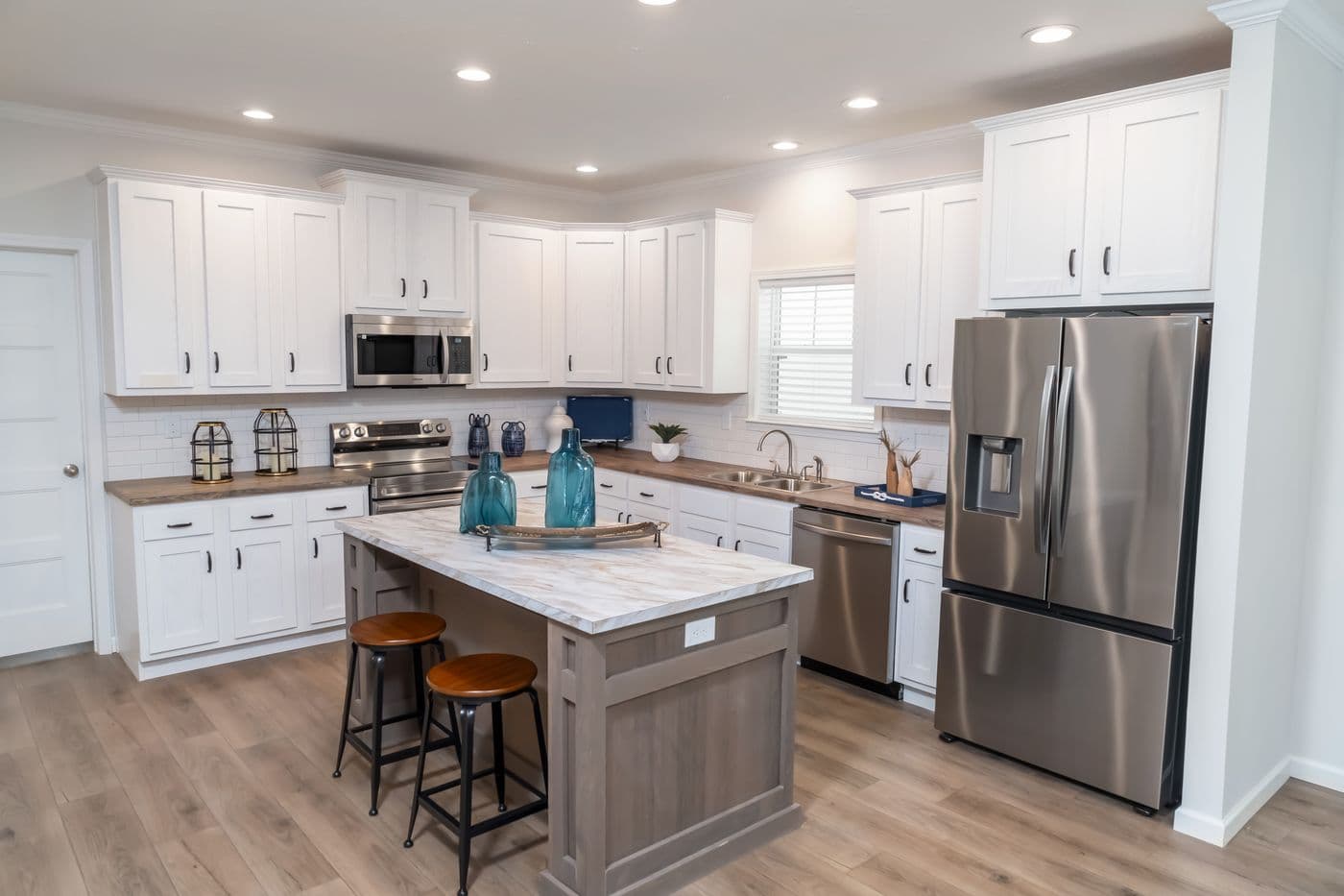 The 1533 THE BROOK HUD Kitchen. This Manufactured Mobile Home features 3 bedrooms and 2 baths.