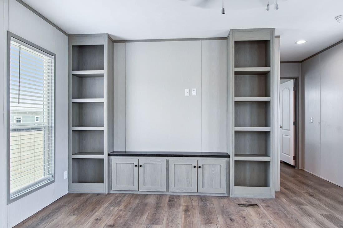 The RESOLUTION 16682X Living Room. This Manufactured Mobile Home features 2 bedrooms and 2 baths.