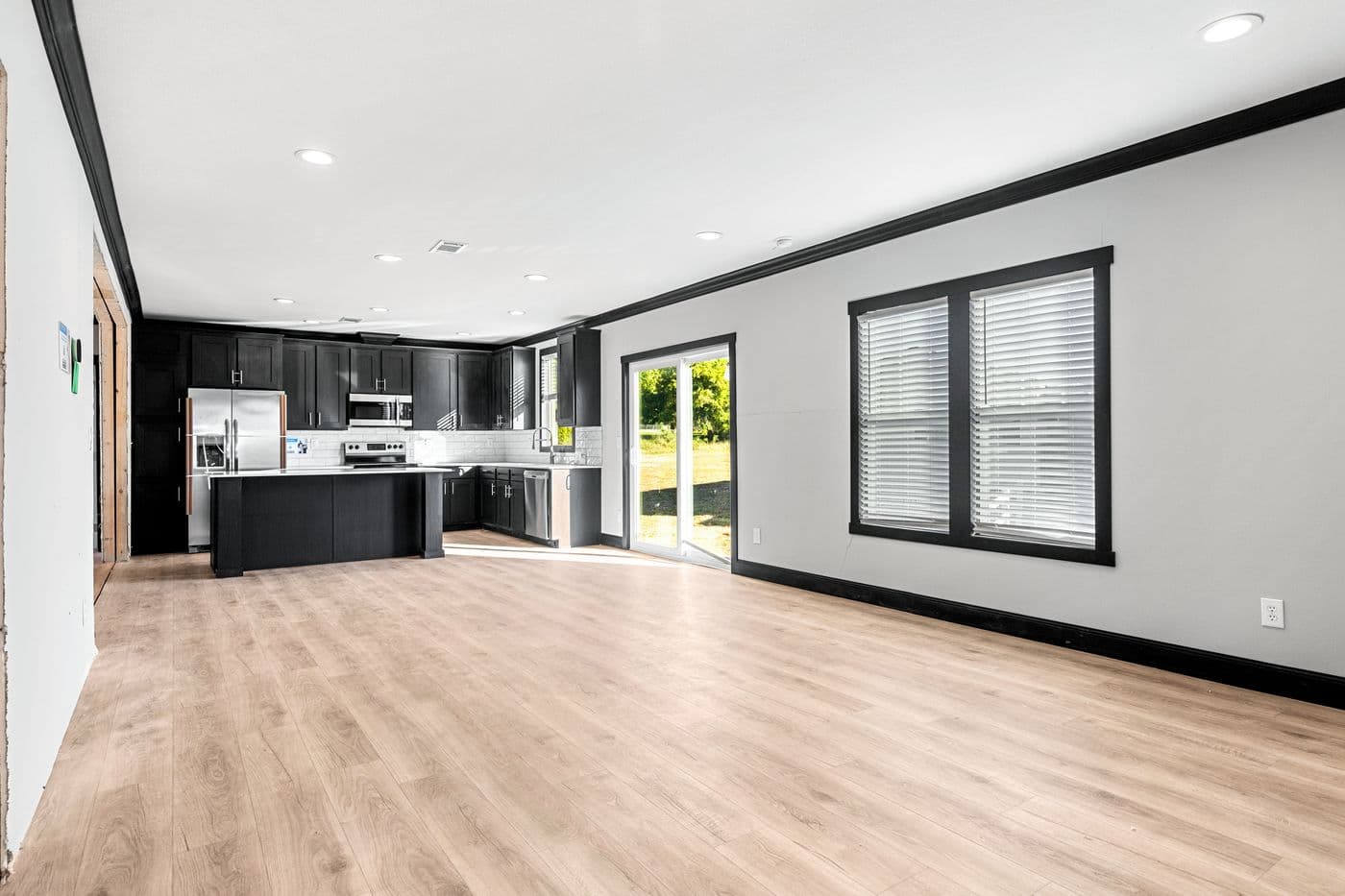 The THE SIERRA Living Room. This Manufactured Mobile Home features 4 bedrooms and 2 baths.