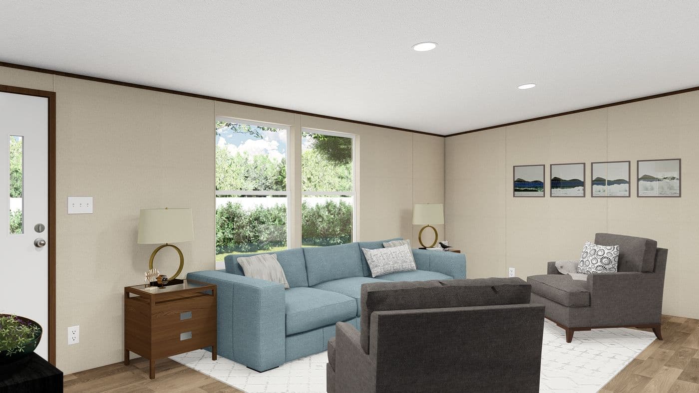 The PRIDE Living Room. This Manufactured Mobile Home features 4 bedrooms and 2 baths.