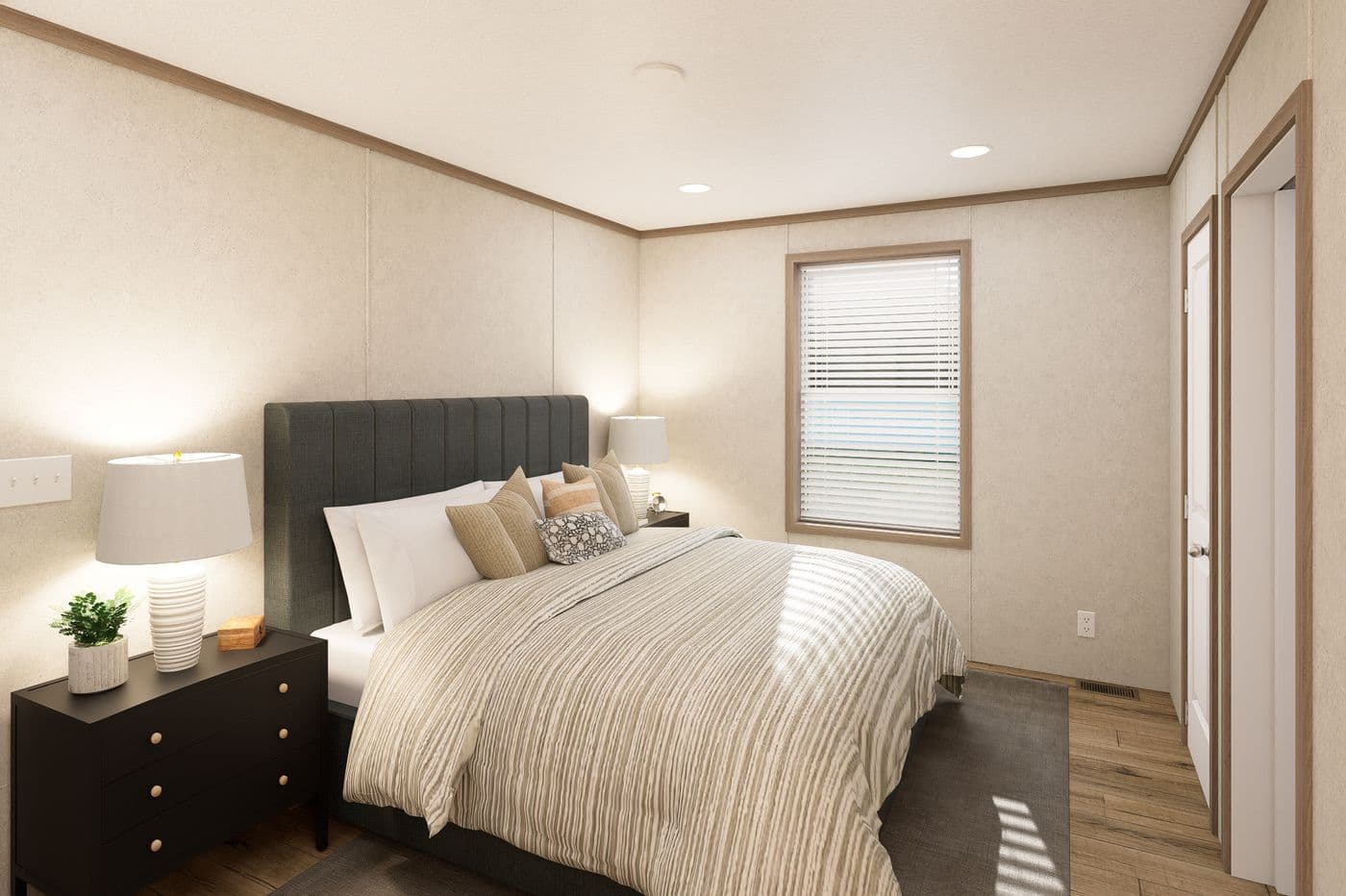 The 6616-CC03 HARBORVIEW 66 Primary Bedroom. This Manufactured Mobile Home features 3 bedrooms and 2 baths.
