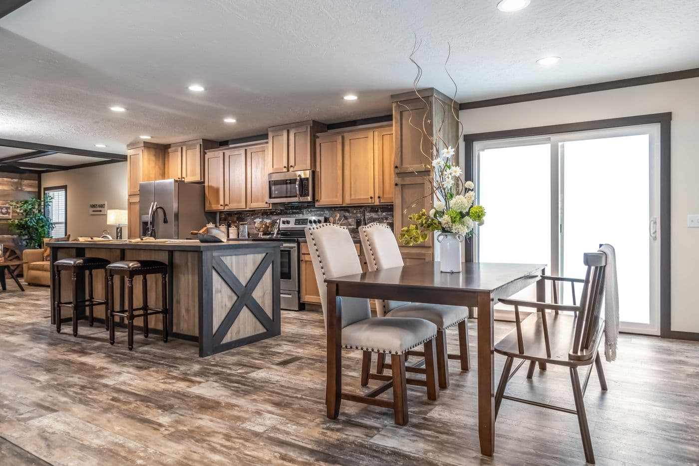 The BOUJEE 2 Dining Area. This Manufactured Mobile Home features 3 bedrooms and 2 baths.