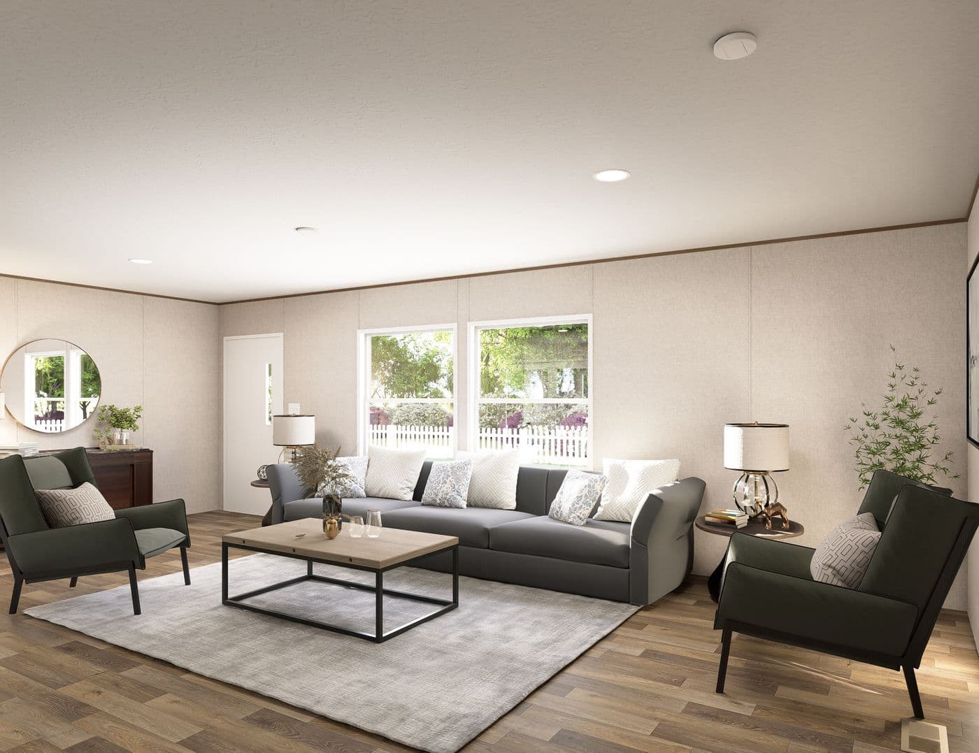The SPRUCE Living Room. This Manufactured Mobile Home features 3 bedrooms and 2 baths.