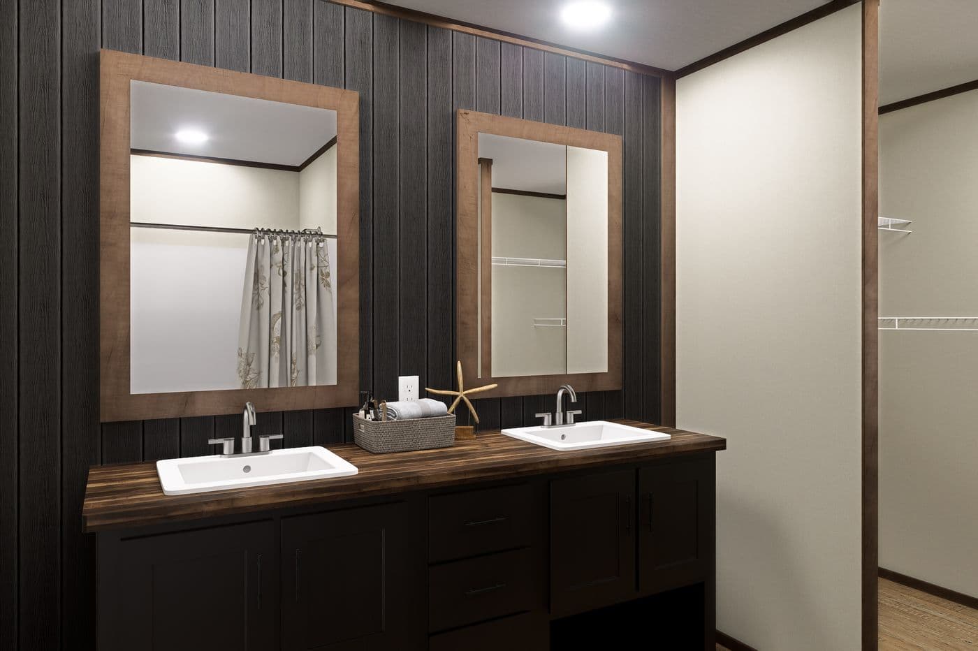 The EXPLORER Primary Bedroom. This Manufactured Mobile Home features 3 bedrooms and 2 baths.