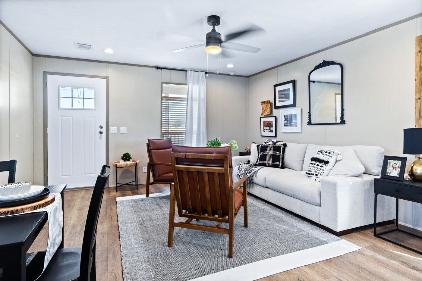 The PORCH LIVING SERIES 16682A Living Room. This Manufactured Mobile Home features 2 bedrooms and 2 baths.