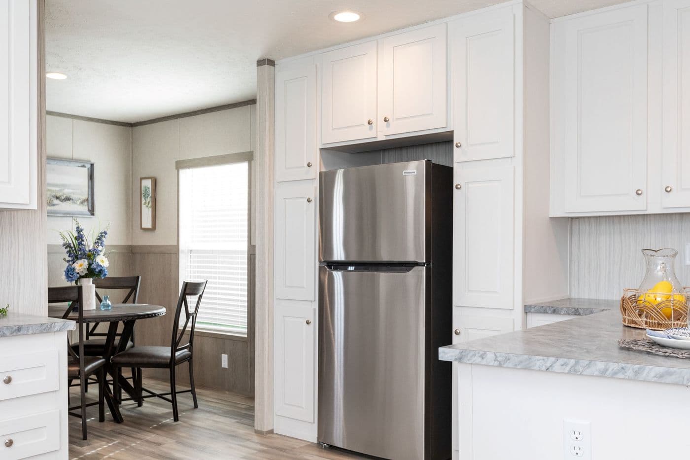 The BLAZER 76 F Kitchen. This Manufactured Mobile Home features 3 bedrooms and 2 baths.