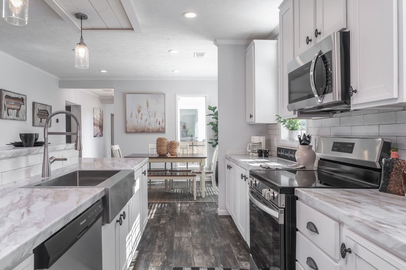 The THE HEWITT Kitchen. This Manufactured Mobile Home features 4 bedrooms and 3 baths.
