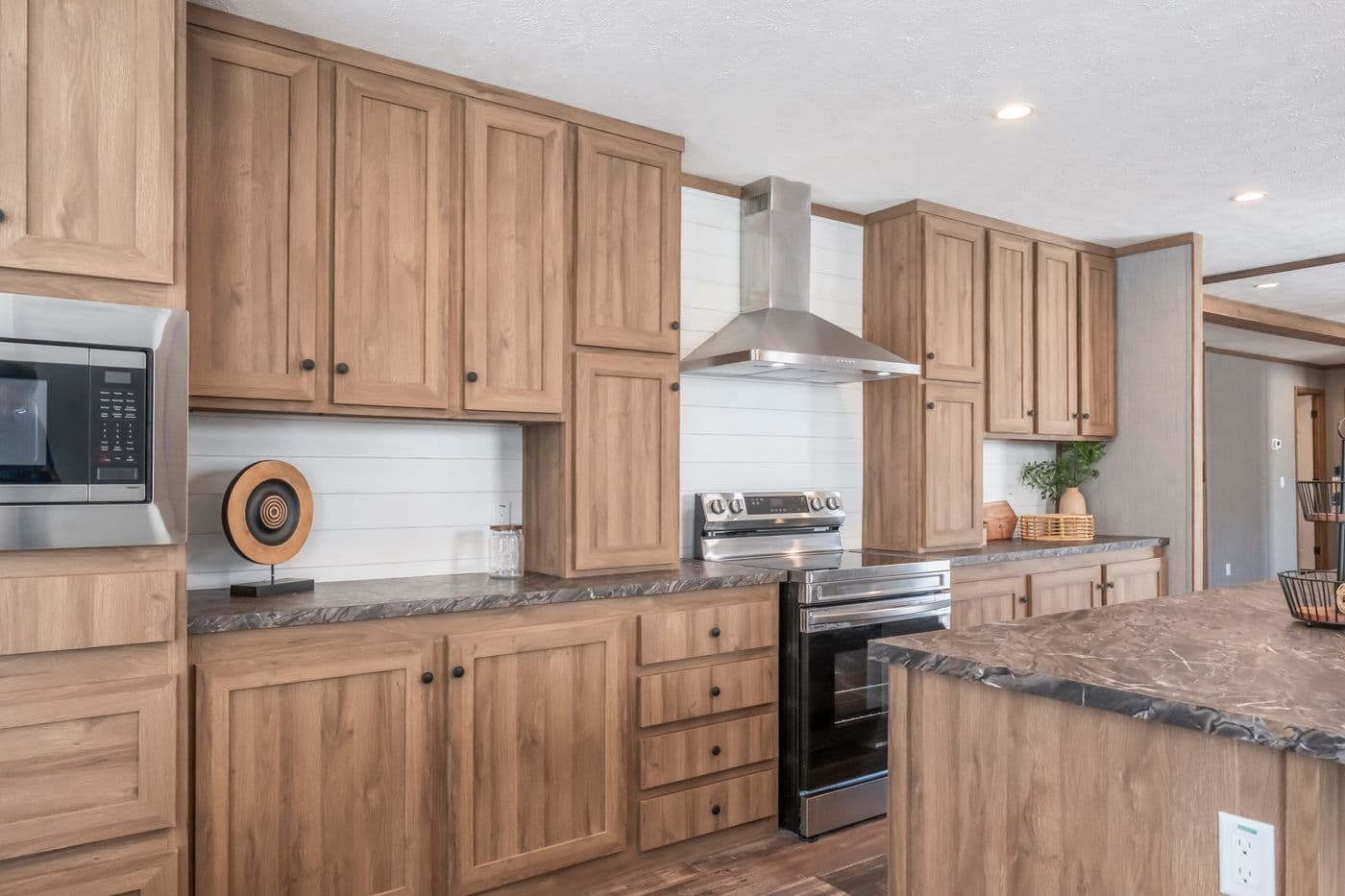 The BLACK DIAMOND Kitchen. This Manufactured Mobile Home features 3 bedrooms and 2 baths.
