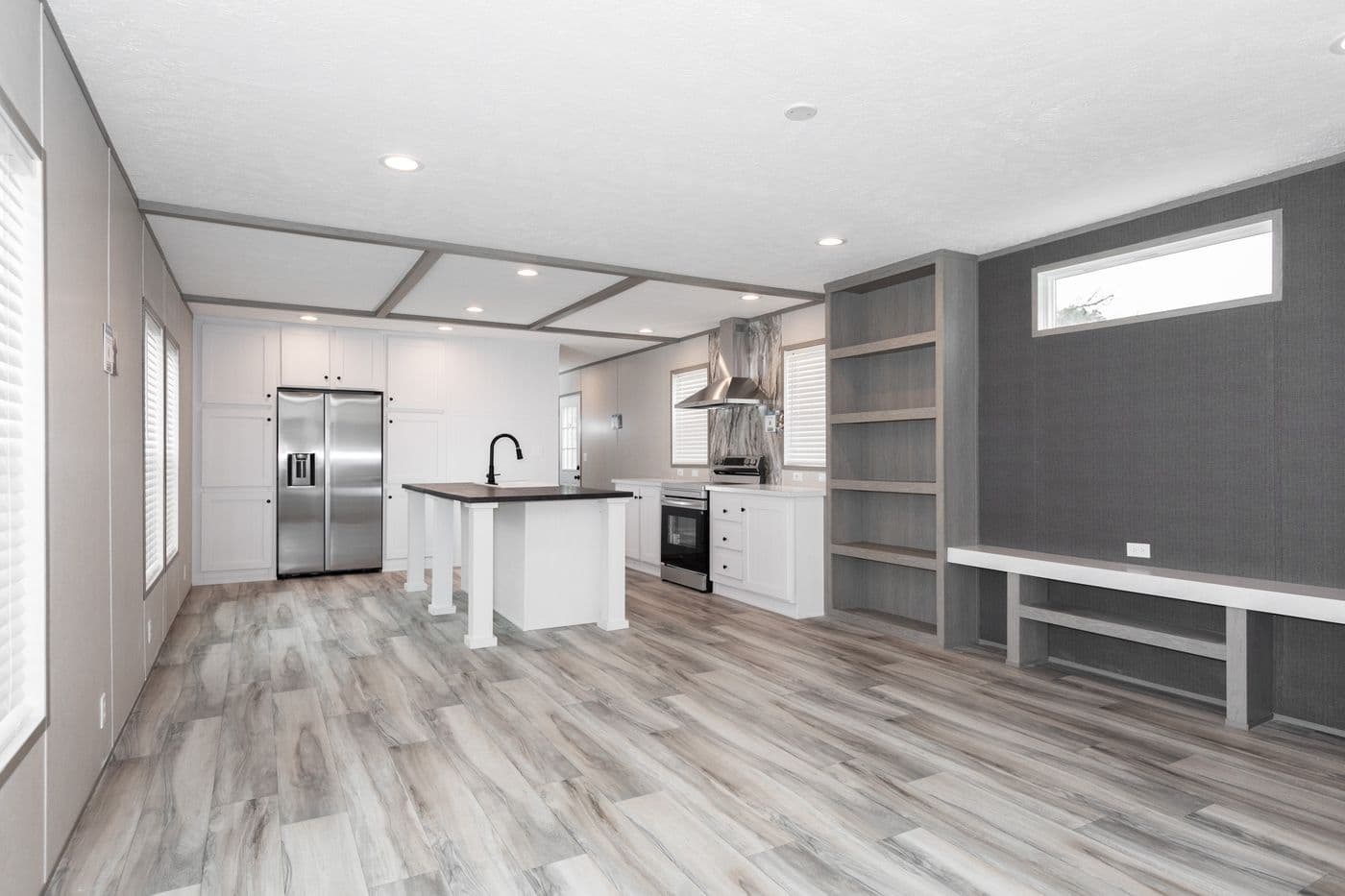 The PLATINUM ANNIVERSARY Living Room. This Manufactured Mobile Home features 3 bedrooms and 2 baths.