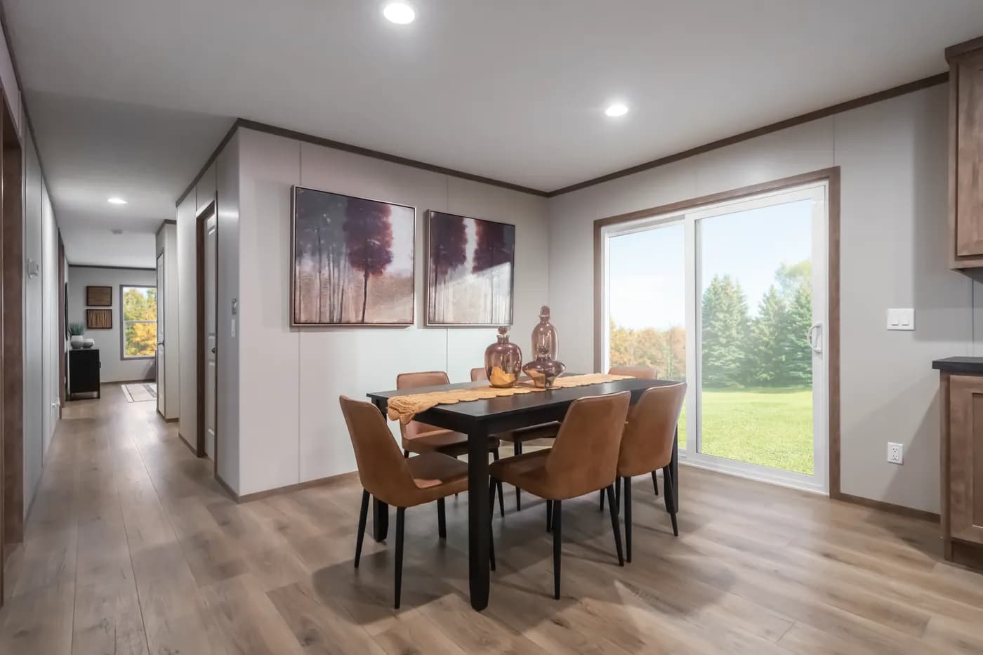 The SEVIER Dining Area. This Manufactured Mobile Home features 4 bedrooms and 3 baths.