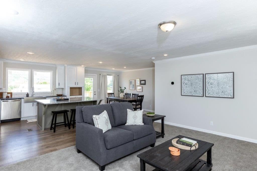 The HAWTHORNE Living Room. This Manufactured Mobile Home features 3 bedrooms and 2 baths.