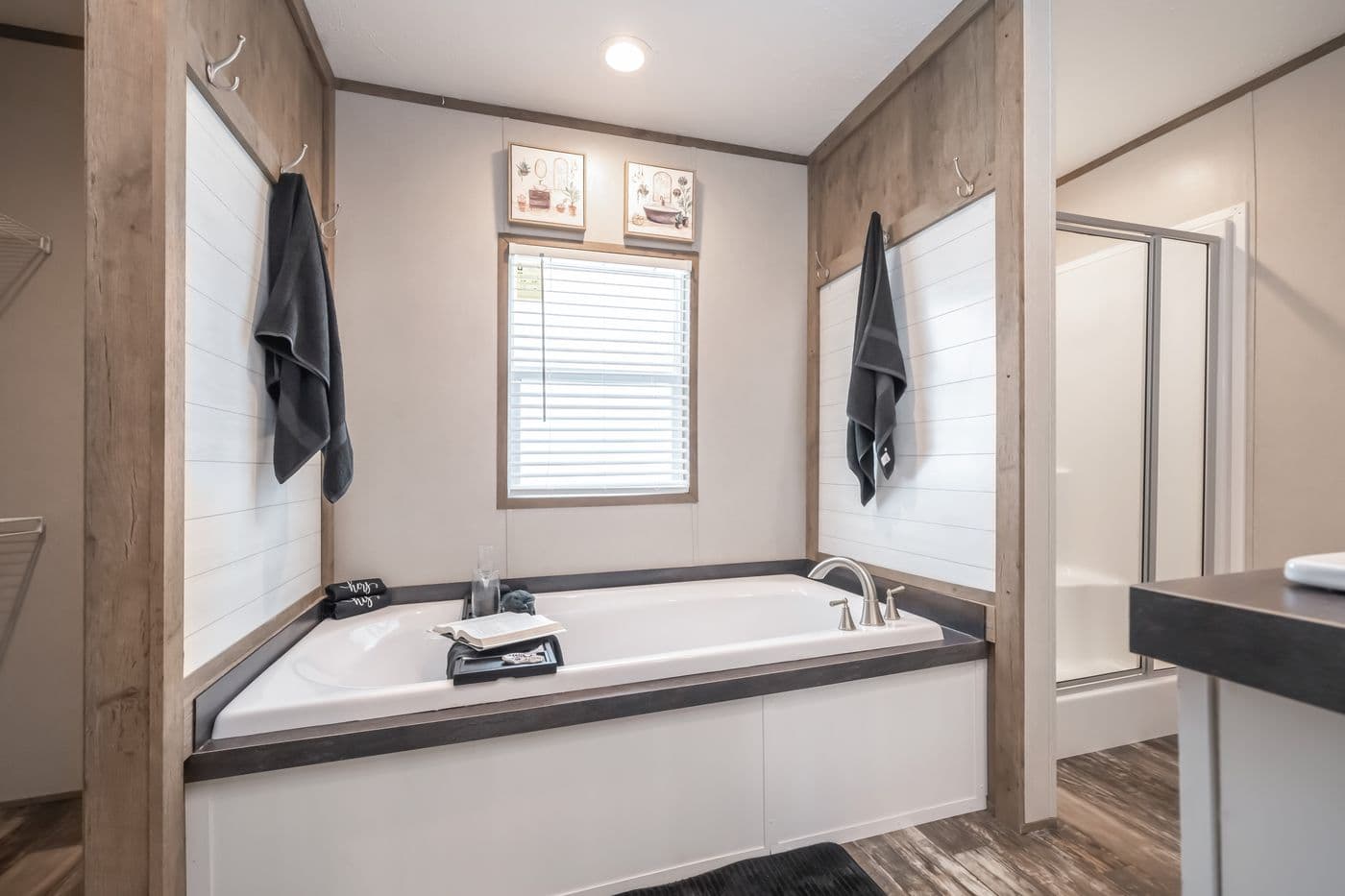 The RIVERHAVEN Primary Bathroom. This Manufactured Mobile Home features 3 bedrooms and 2 baths.