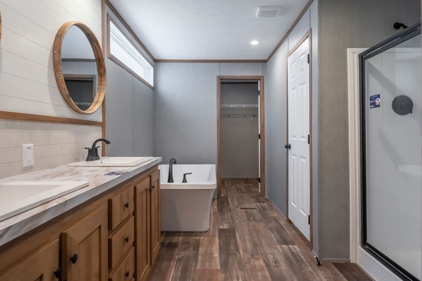 The BLACK DIAMOND Primary Bathroom. This Manufactured Mobile Home features 3 bedrooms and 2 baths.