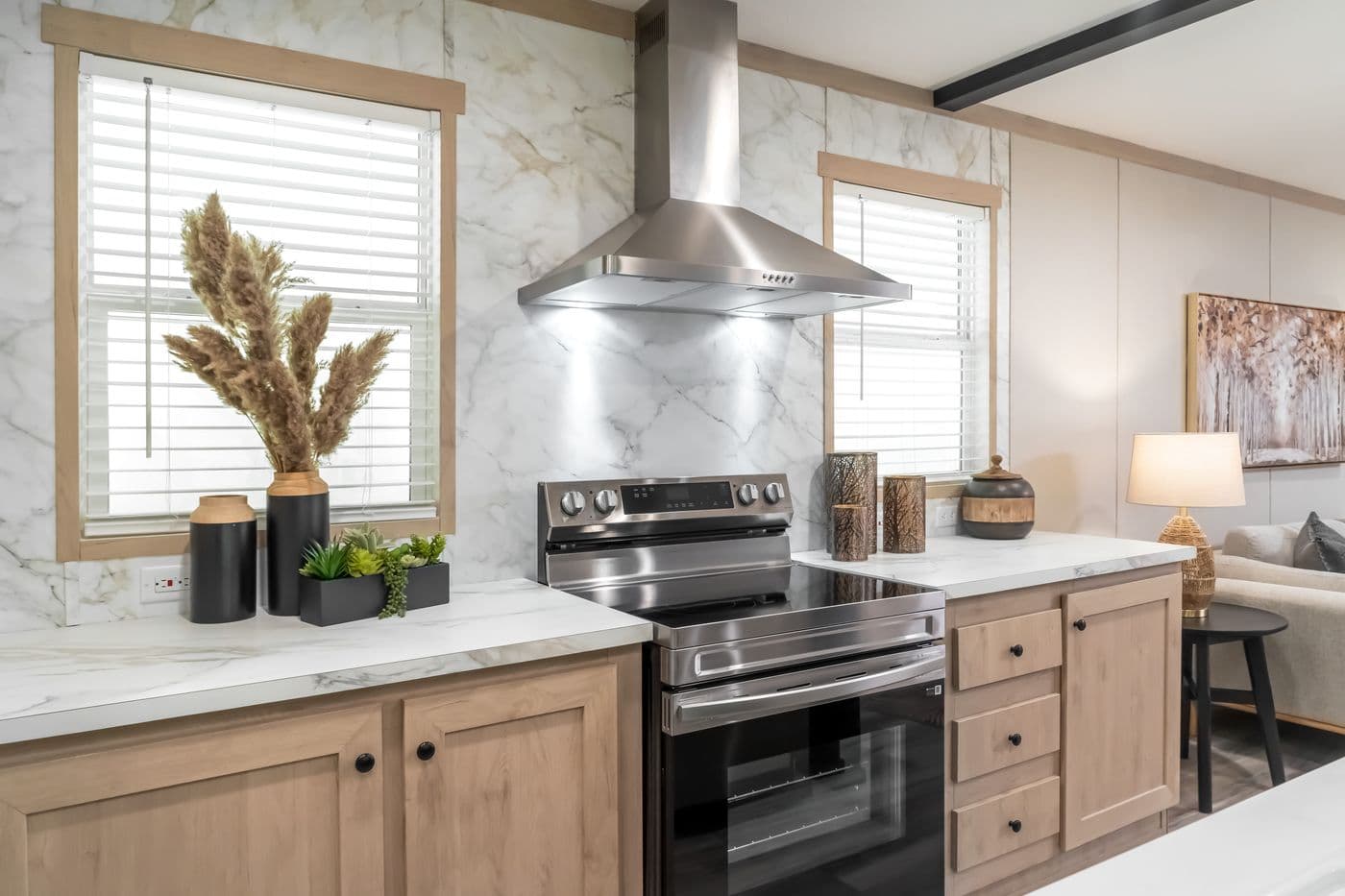 The ANNIVERSARY JEWEL Kitchen. This Manufactured Mobile Home features 3 bedrooms and 2 baths.