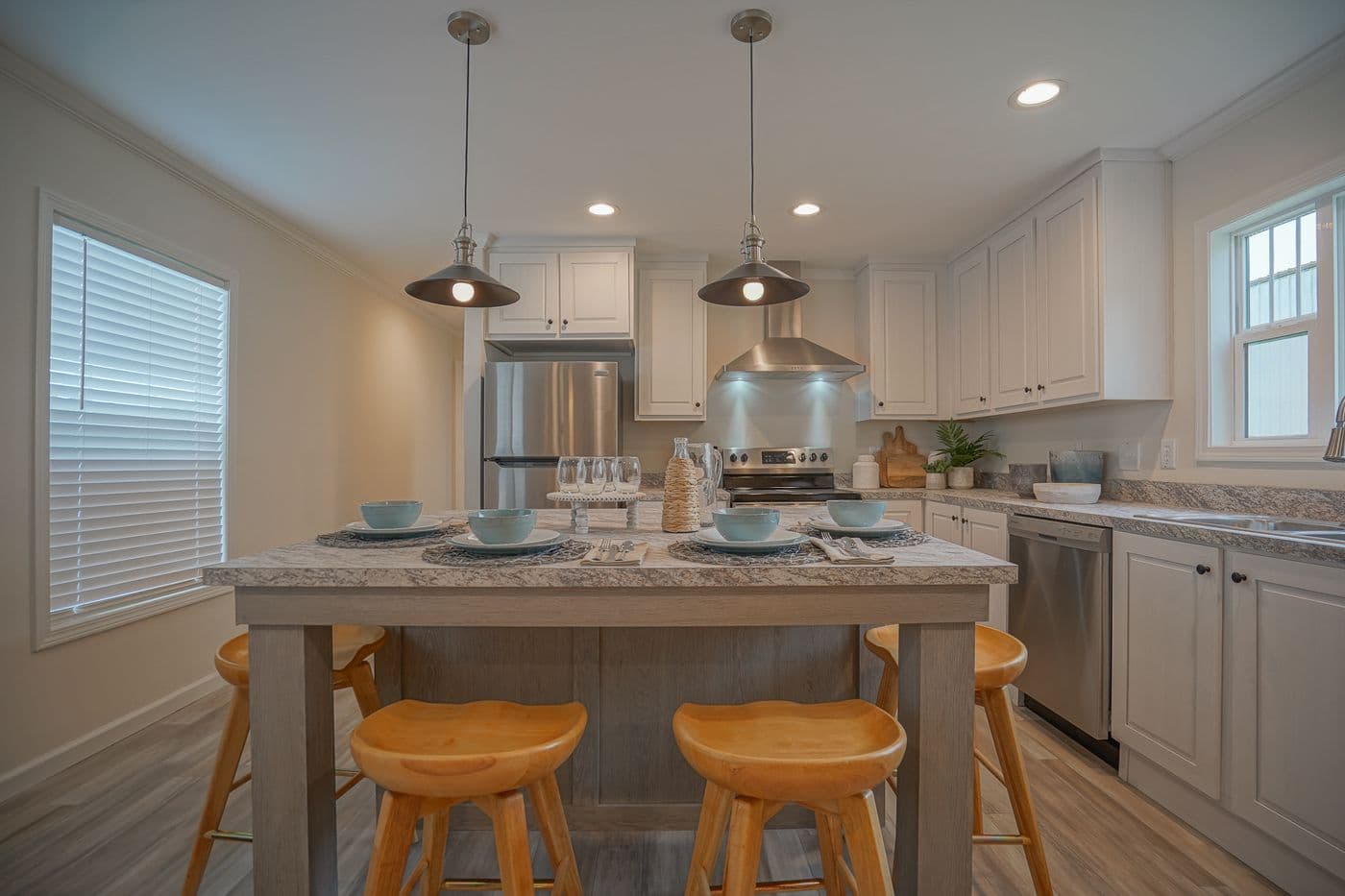 The 777-2 "COOL BREEZE" 7616 Kitchen. This Manufactured Mobile Home features 3 bedrooms and 2 baths.