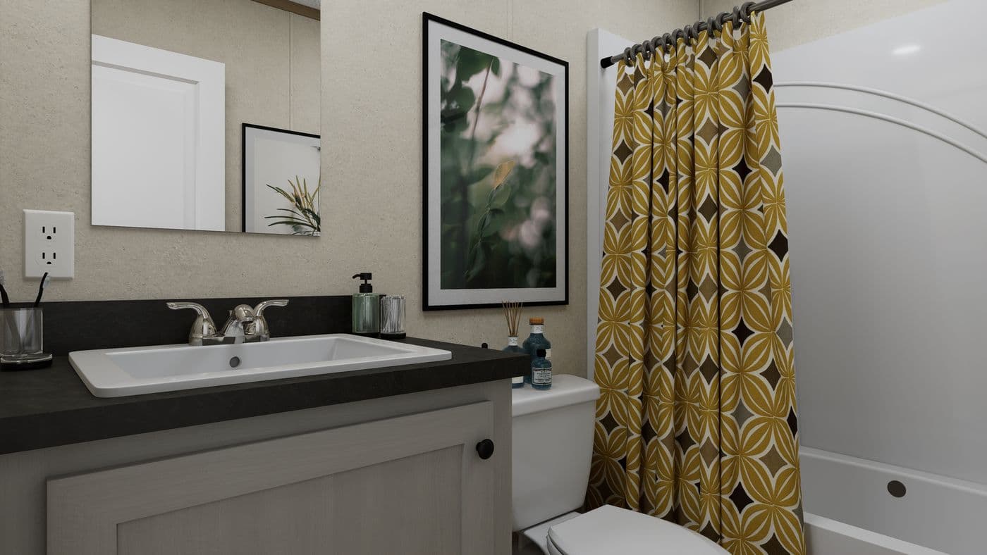 The 5624-CC56 GUARDIAN 56 Guest Bathroom. This Manufactured Mobile Home features 3 bedrooms and 2 baths.