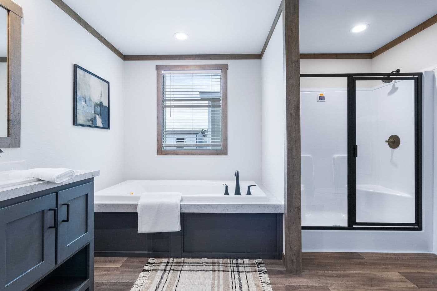 The FARM 3 FLEX Primary Bathroom. This Manufactured Mobile Home features 3 bedrooms and 2 baths.