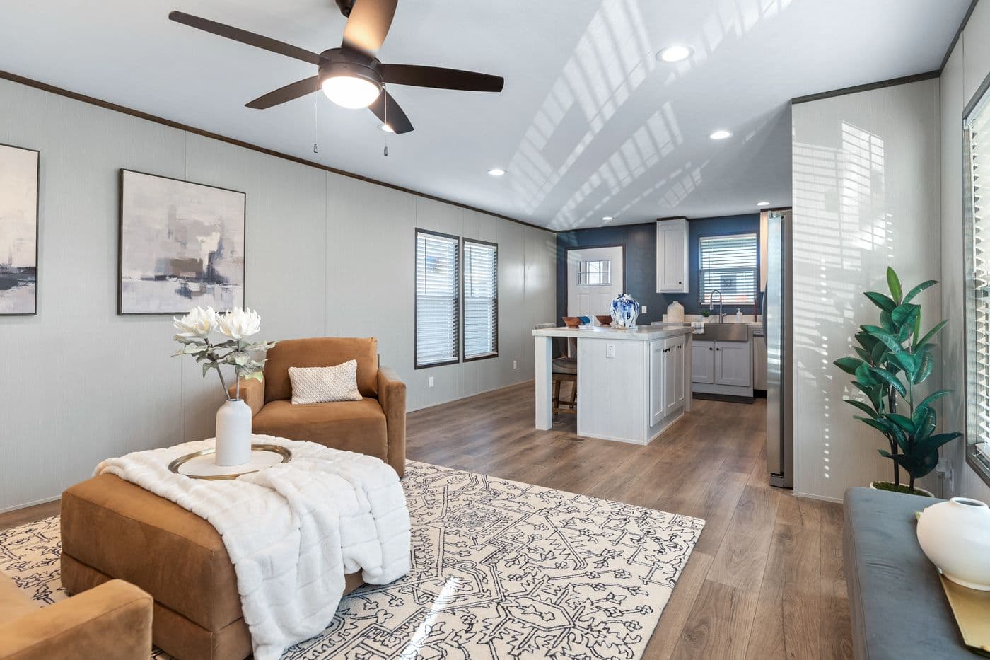 The RETREAT LIVING 16682A Living Room. This Manufactured Mobile Home features 2 bedrooms and 2 baths.