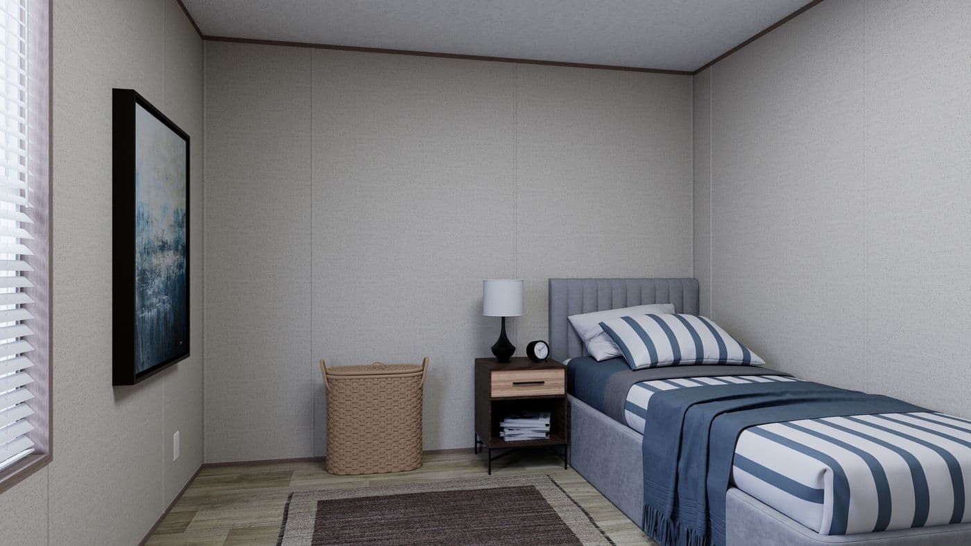 The FOOTHILLS 72 Guest Bedroom. This Manufactured Mobile Home features 3 bedrooms and 2 baths.