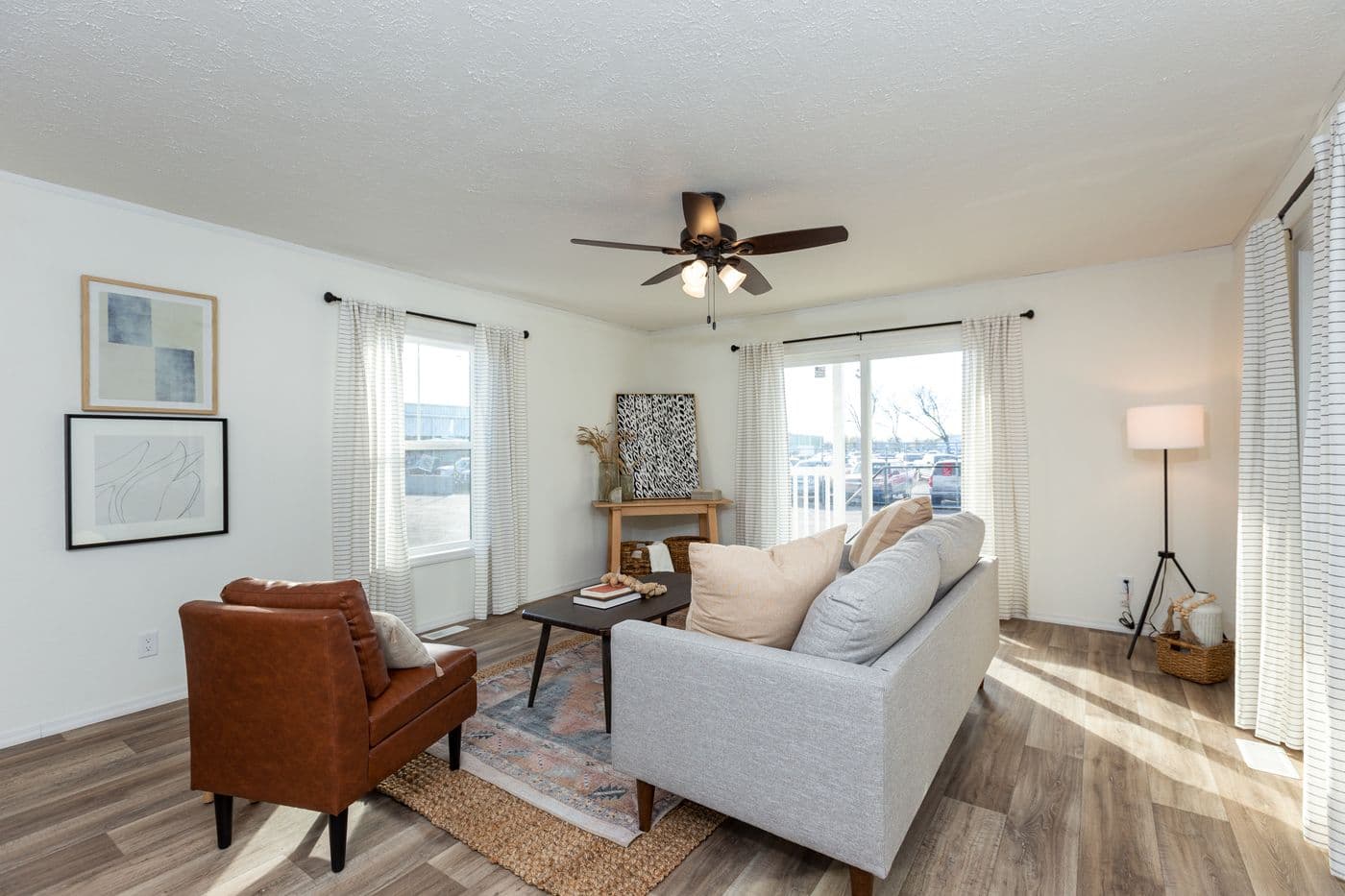 The LIFESTYLE 208 Living Room. This Manufactured Mobile Home features 3 bedrooms and 2 baths.