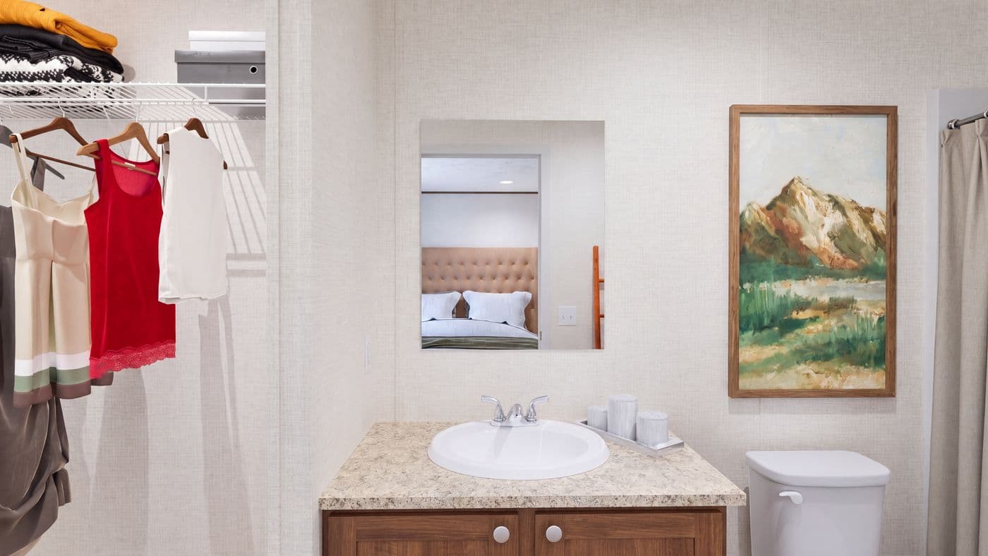 The DOGWOOD Primary Bathroom. This Manufactured Mobile Home features 2 bedrooms and 2 baths.