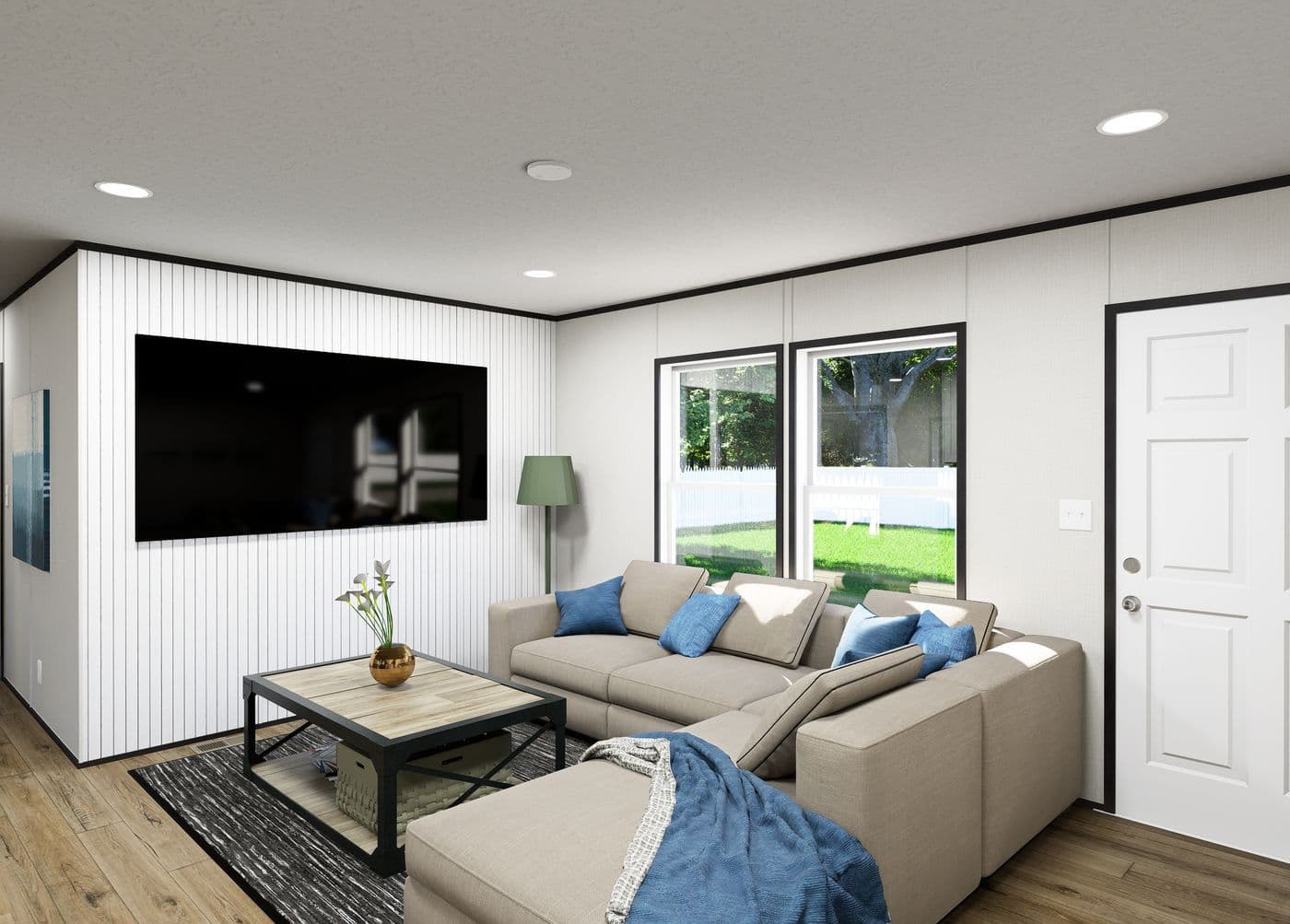 The VISTA Living Room. This Manufactured Mobile Home features 3 bedrooms and 2 baths.