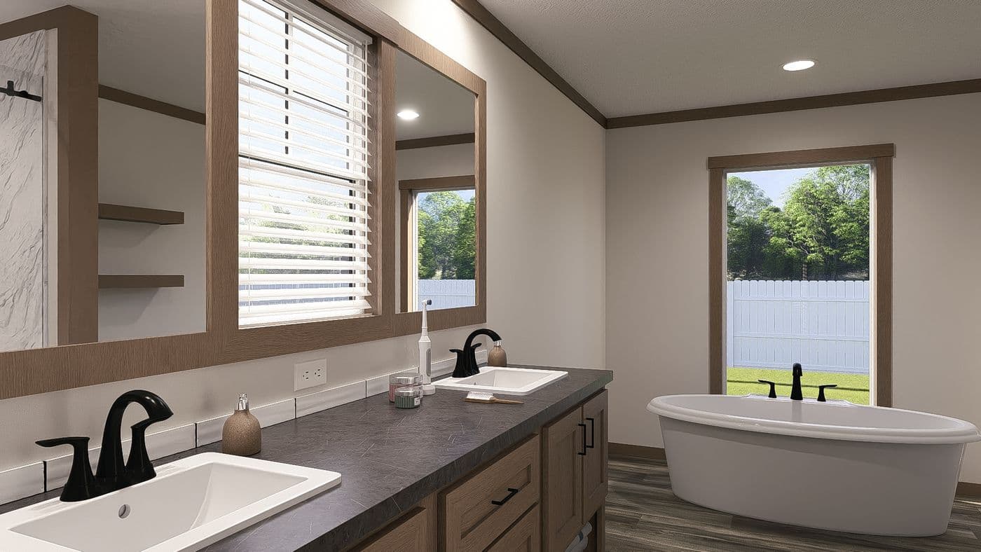 The NELLIE ELITE Primary Bathroom. This Manufactured Mobile Home features 4 bedrooms and 3 baths.