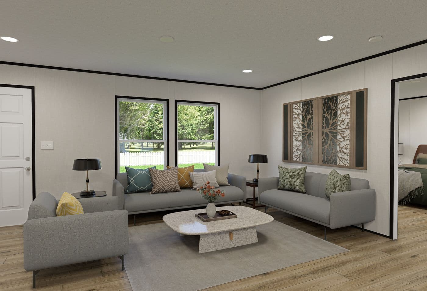The ECLIPSE Living Room. This Manufactured Mobile Home features 4 bedrooms and 2 baths.