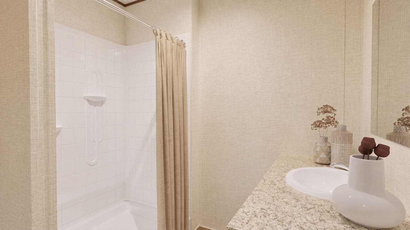The SPRUCE Primary Bathroom. This Manufactured Mobile Home features 3 bedrooms and 2 baths.