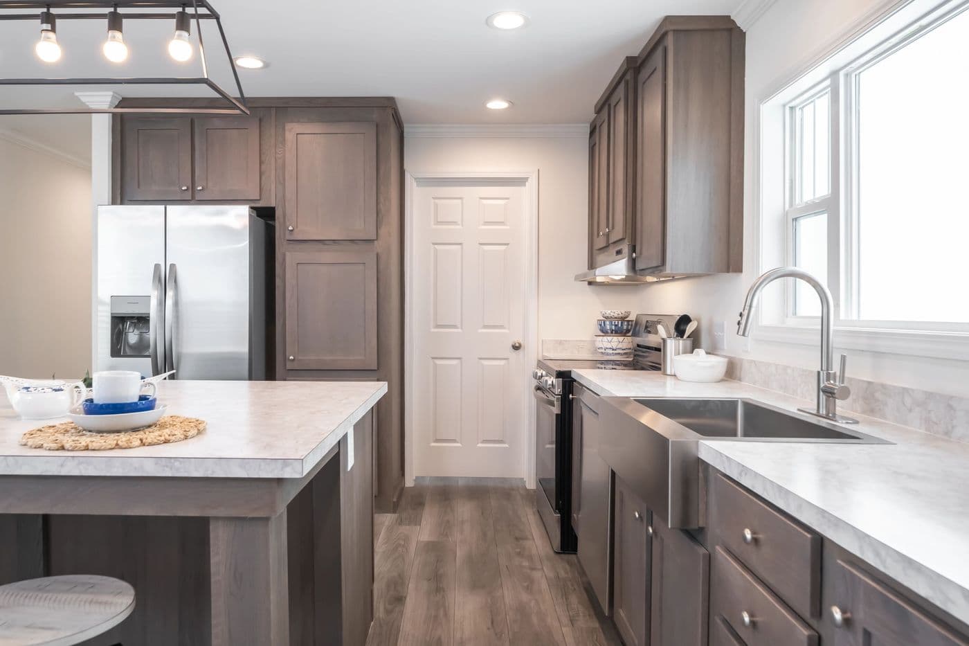The 5406 "PINEHAVEN" 7616 Kitchen. This Manufactured Mobile Home features 3 bedrooms and 2 baths.