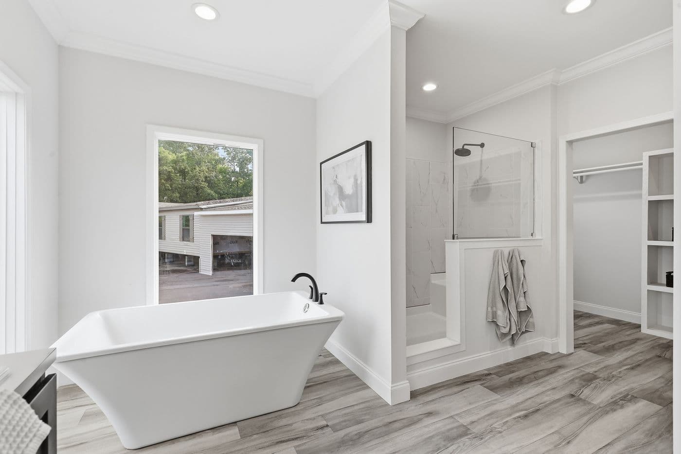 The THE SUMMIT Primary Bathroom. This Manufactured Mobile Home features 3 bedrooms and 2 baths.