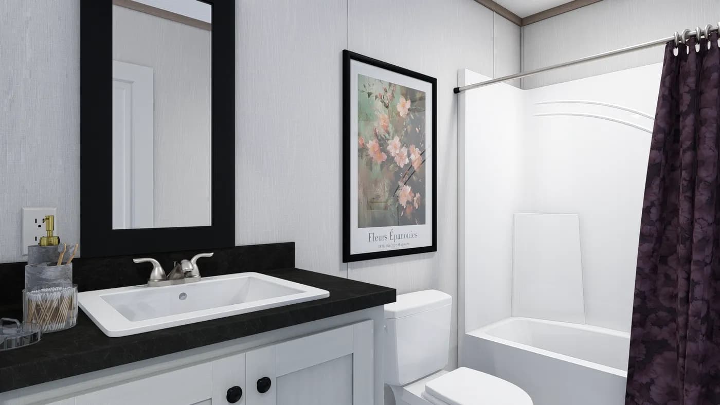 The 5228-E774P THE PULSE Guest Bathroom. This Manufactured Mobile Home features 3 bedrooms and 2 baths.