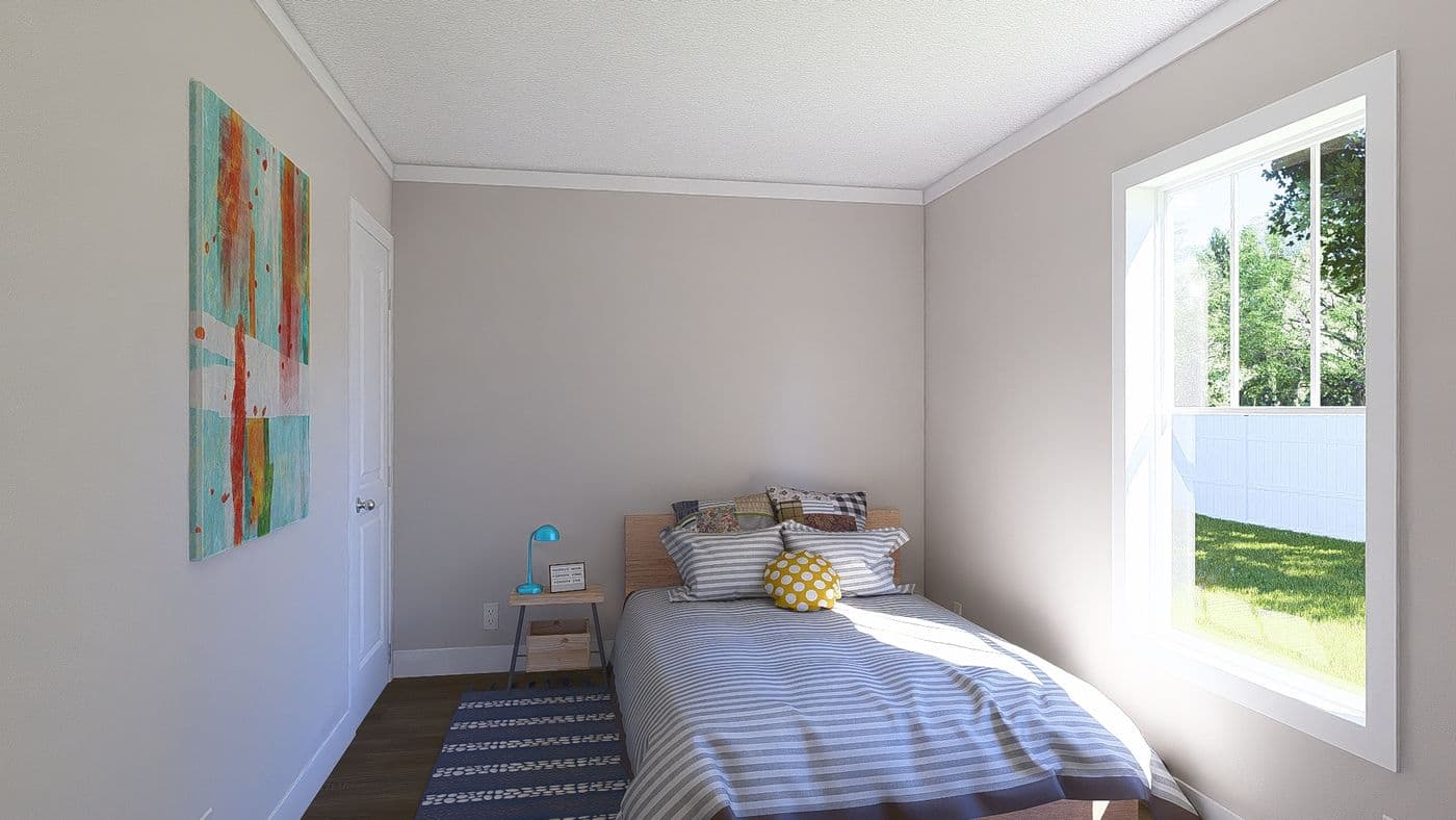 The MOVE ON UP Guest Bedroom. This Manufactured Mobile Home features 3 bedrooms and 2 baths.