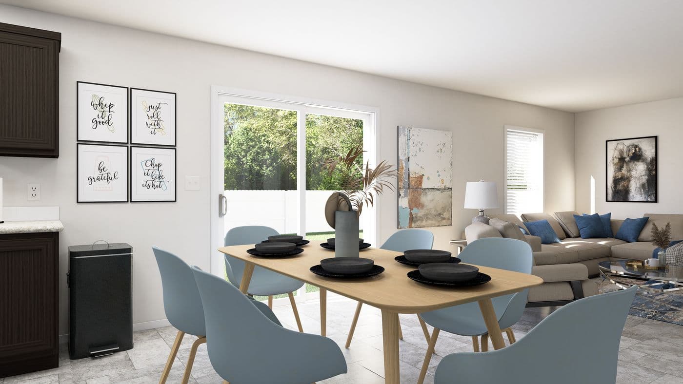 The SLE 561F Dining Area. This Manufactured Mobile Home features 3 bedrooms and 2 baths.