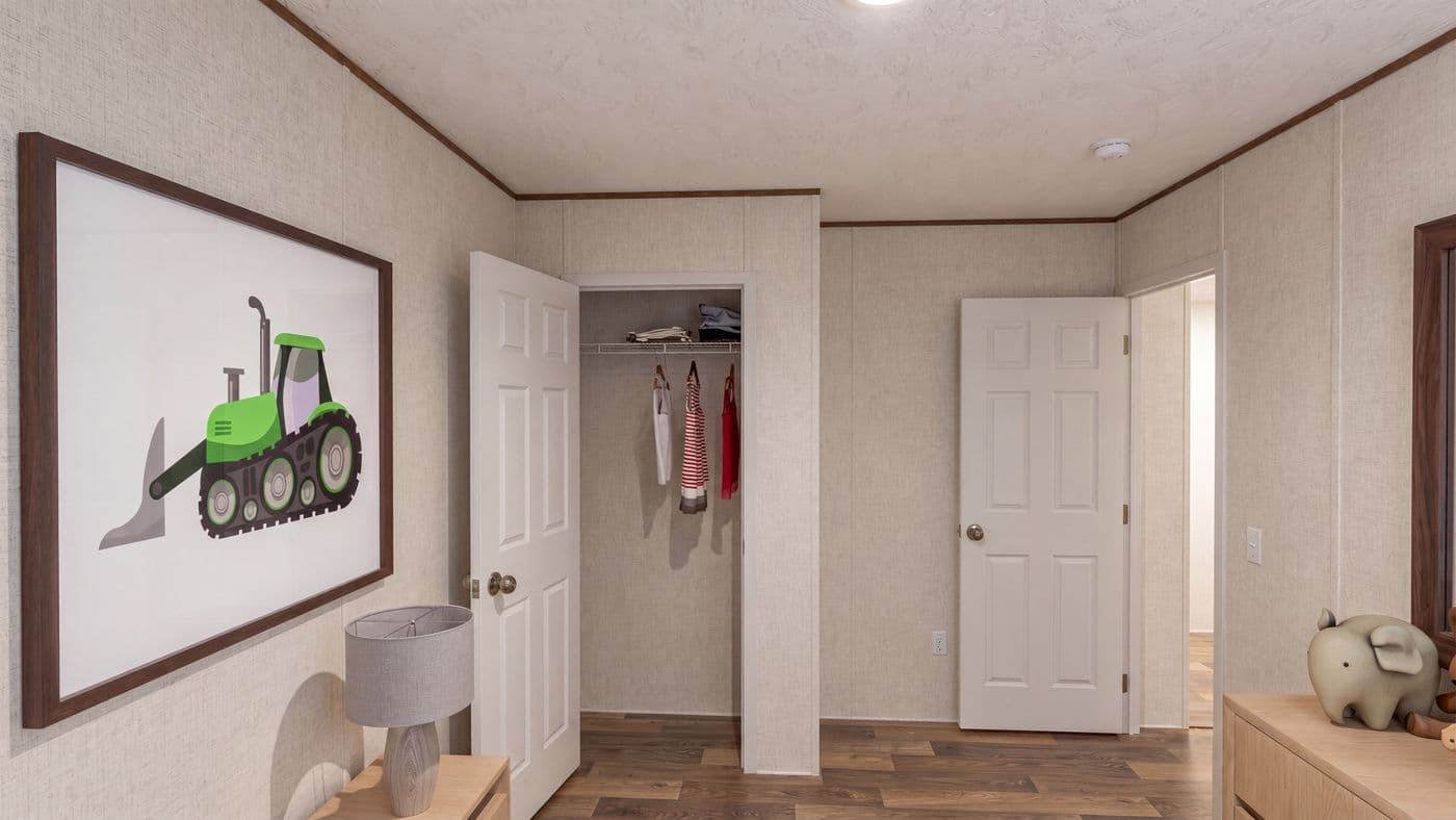 The OAK Bedroom. This Manufactured Mobile Home features 4 bedrooms and 2 baths.
