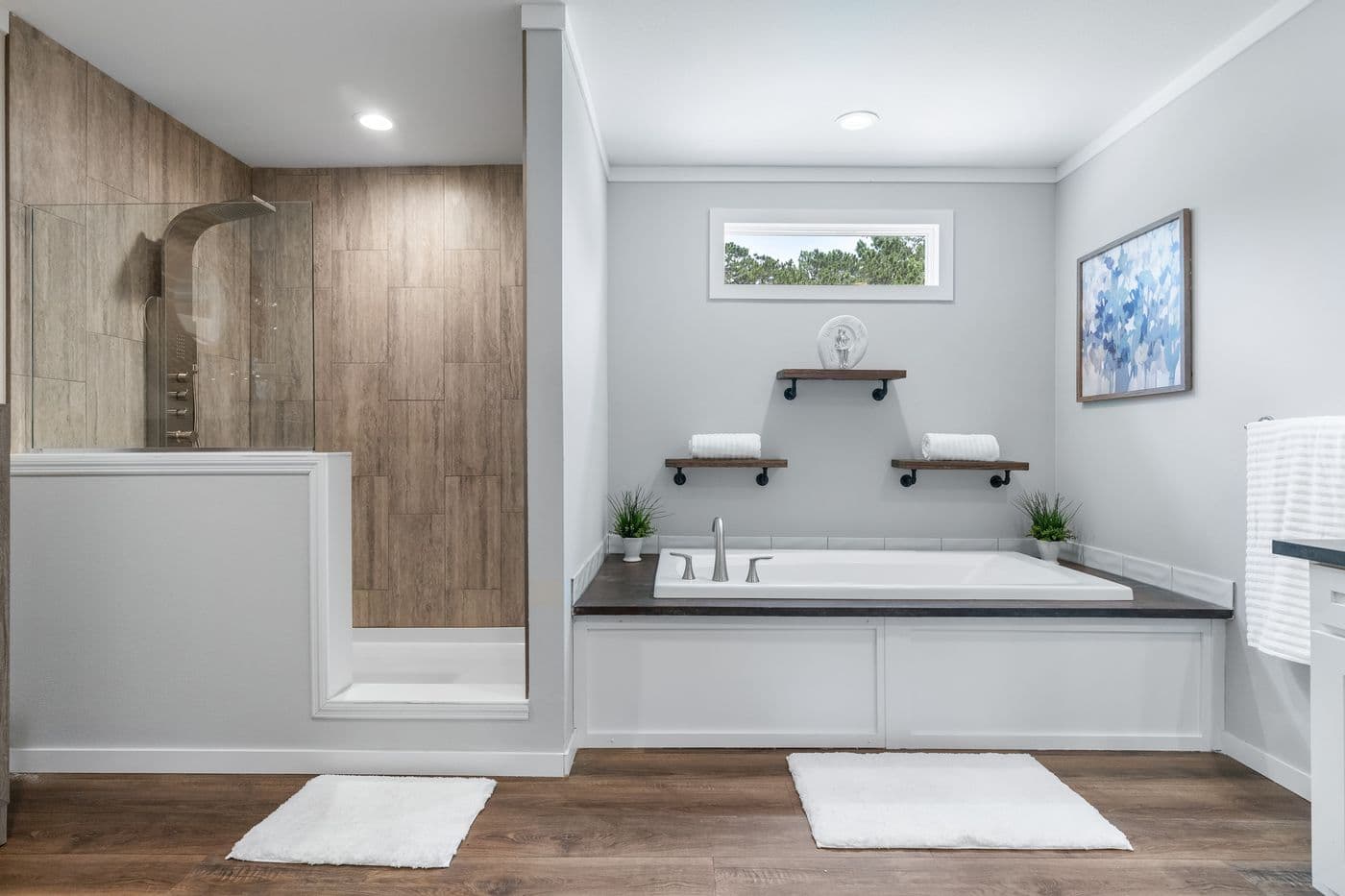The THE MONTERREY Primary Bedroom. This Manufactured Mobile Home features 4 bedrooms and 3 baths.
