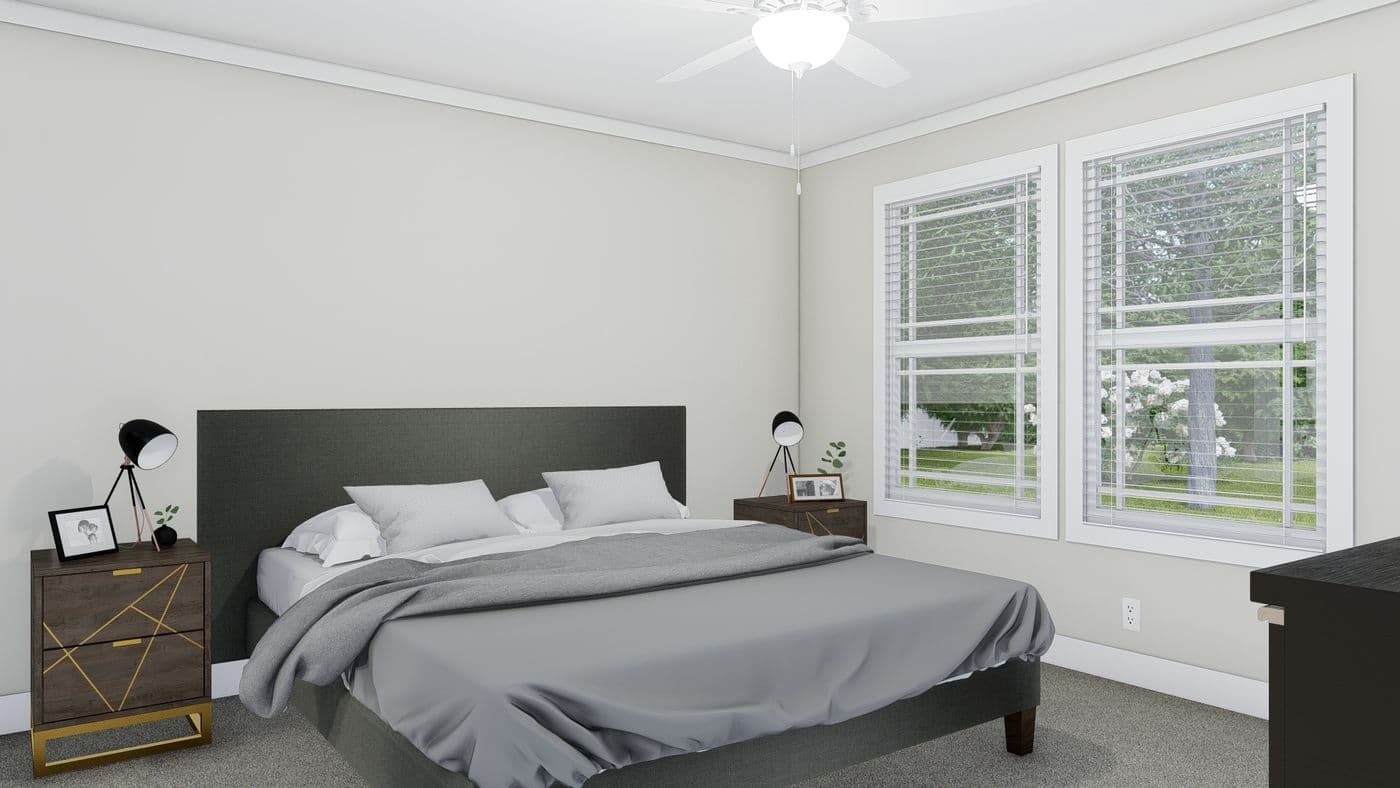 The CLASSIC 56D Primary Bedroom. This Manufactured Mobile Home features 3 bedrooms and 2 baths.
