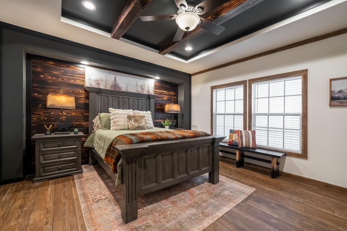 The THE MILL HOUSE Primary Bedroom. This Manufactured Mobile Home features 3 bedrooms and 2 baths.