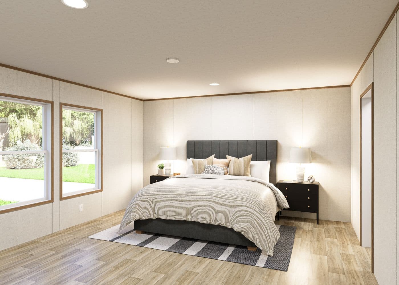 The HARBOR Primary Bedroom. This Manufactured Mobile Home features 3 bedrooms and 2 baths.