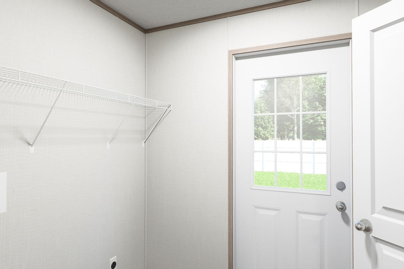 The ATLAS Utility Room. This Manufactured Mobile Home features 2 bedrooms and 2 baths.